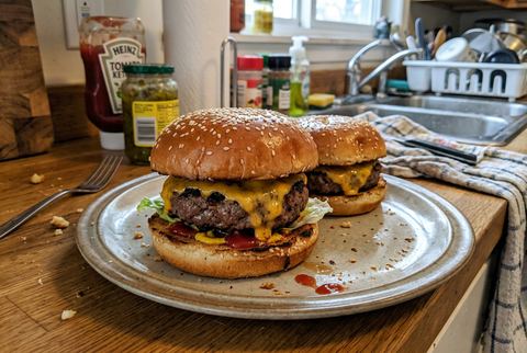 Juicy air fryer hamburger with melted cheese on a toasted bun