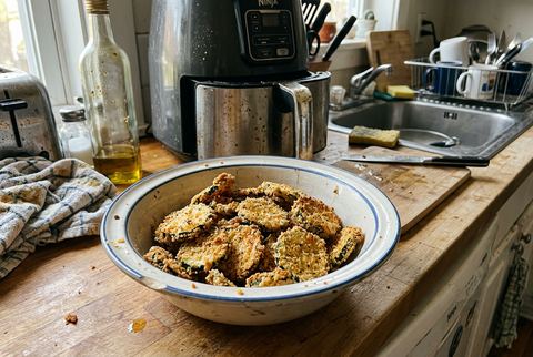 Crispy breaded air fryer zucchini chips, golden brown