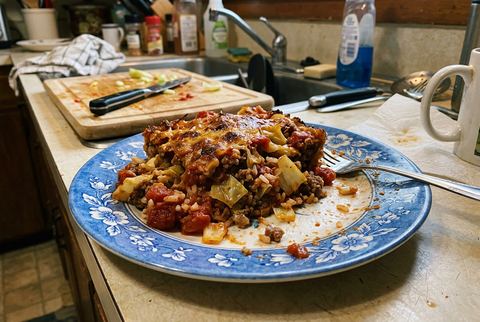 Unstuffed cabbage roll casserole with ground beef, rice, and tomato sauce