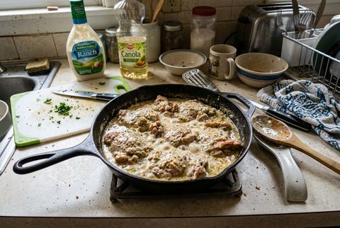 Creamy ranch chicken in a skillet with herbed cream sauce