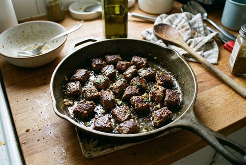 Seared garlic butter steak bites in a cast iron skillet