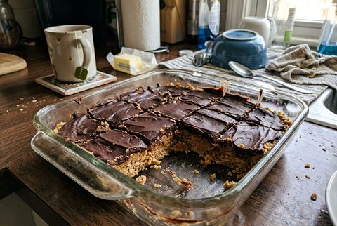 No bake peanut butter bars with chocolate topping, cut in squares